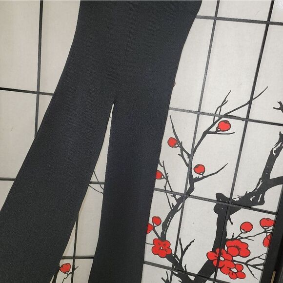 MAJE Pariso Flared-Leg High-Rise Stretch Ribbed-Knit Trousers - Picture 4 of 11